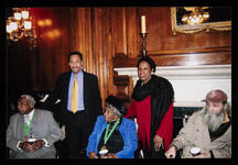 Survivors Otis Granville Clark, Thelma Thurman Knight, and Robert Holloway (all seated) with Representative Melvin "Mel" Luther Watt, and Representative Sheila Jackson Lee, standing behind them in Washington, District of Columbia